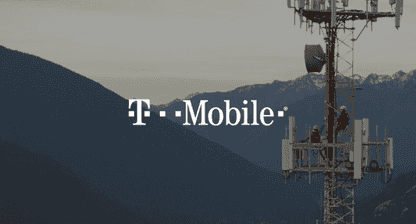 T mobile logo overlaying a landscape image of snowy mountains with some men working on a utility pole