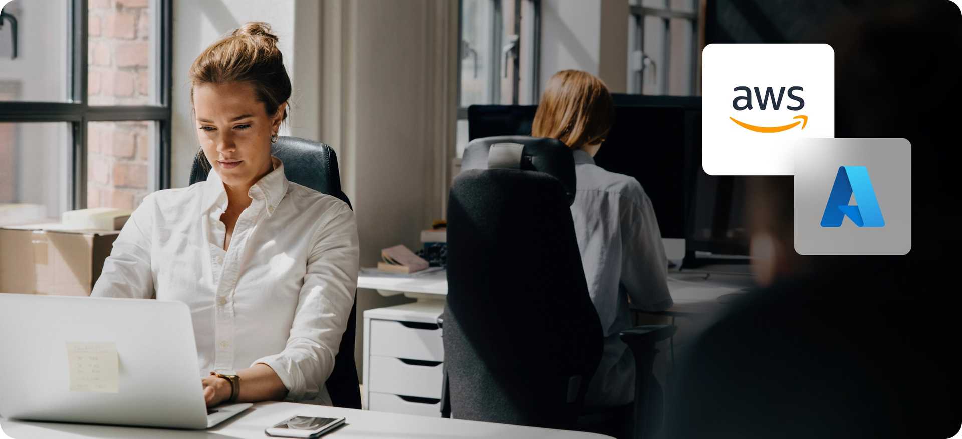 2 women on their working stations and the AWS and Azure logos on the corner