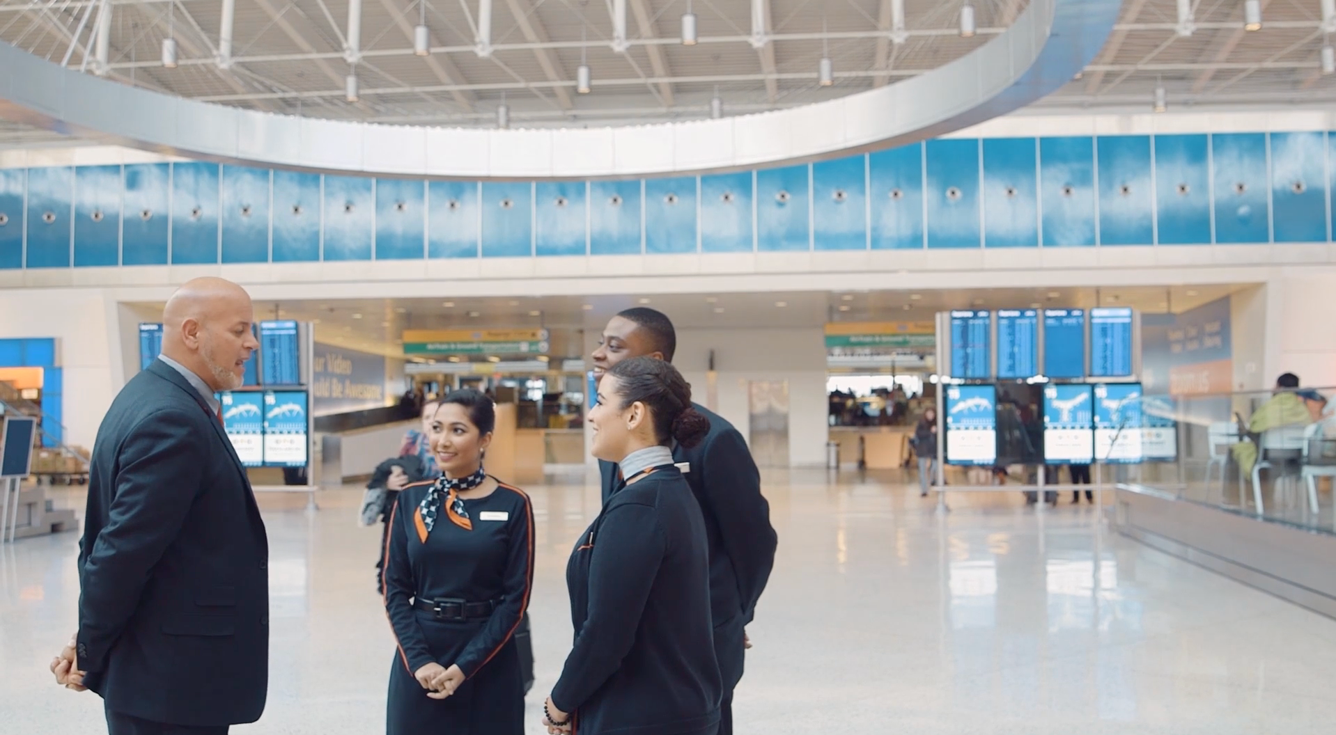 Jetblue Airline members at the airport image.