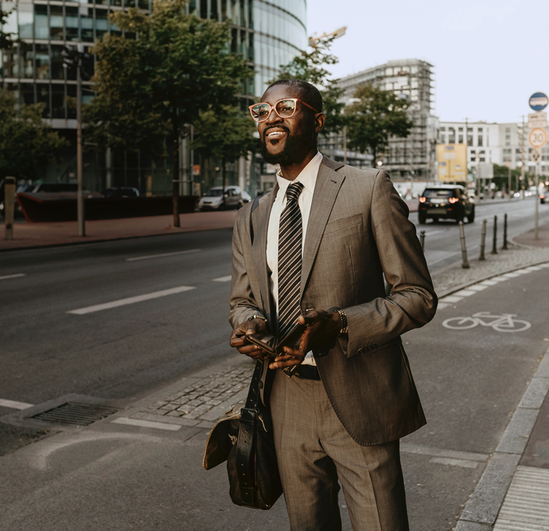 man standing on the sidewalk